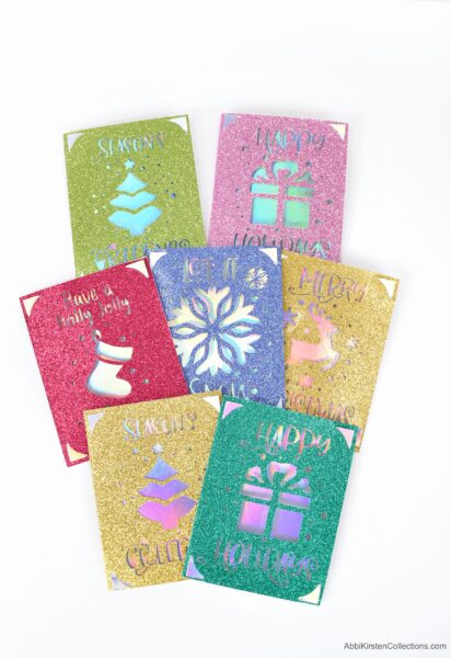 Learn how to make Christmas cards with your Cricut machine. Featuring the Cricut Joy machine use the card mat to make quick easy Christmas cards.