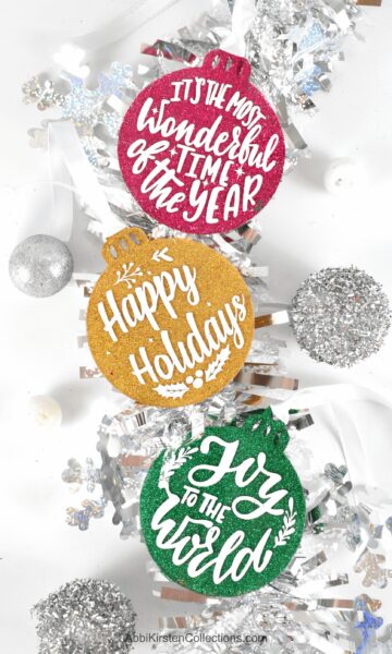 Glitter ornaments from clear acrylic disks.