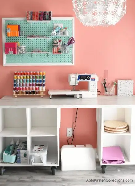 My craft table is a DIY project using Ikea storage cubes and a simple tabletop. Building your craft table lets you customize your storage and organize your workspace. 