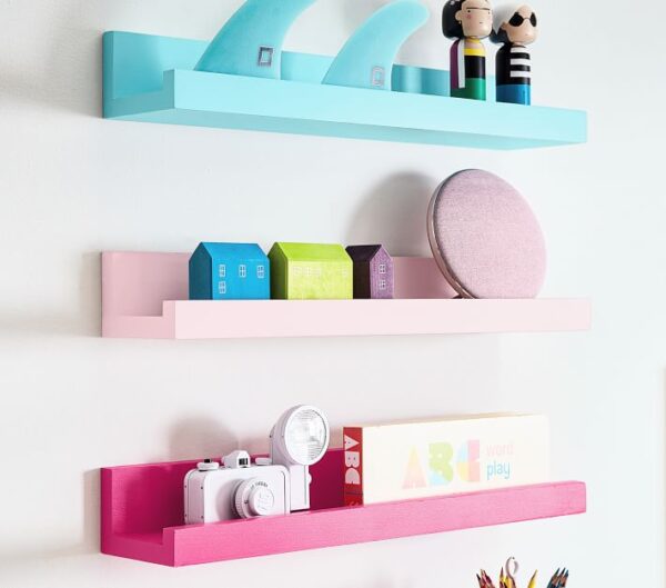 The photo blue, pink, and red ledges mounted on a white wall. These floating shelves are from pottery barn. 