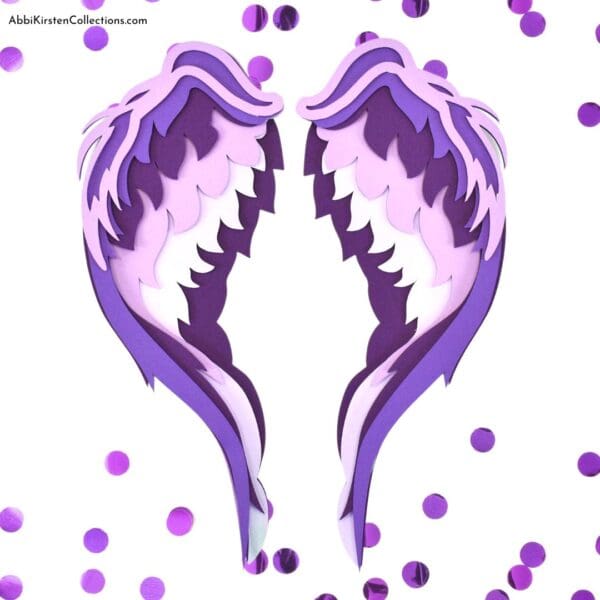 3D paper angel wings craft in pink glitter cardstock. Download free angel wings SVG cut files. 