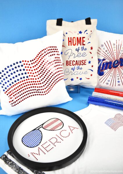 Red, white and blue holographic iron-on vinyl with faux rhinestone July 4th designs on pillows, tote bags, signs and shirts. Cricut holographic vinyl can be used for so many holiday crafts!