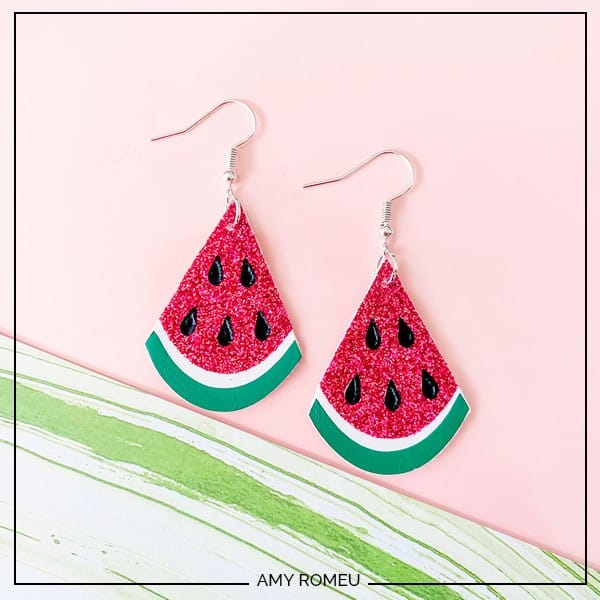 A pair of earrings designed to look like watermelon slices. This free summer SVG is one of many found in this round-up.