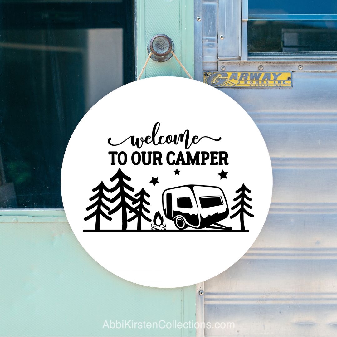 Welcome to our camper SVG files on a round wood sign. 