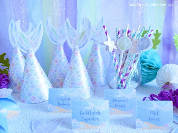More ‘Under the Sea’ party printables including mermaid tail party hats, drink straws, and treat labels for all the party snacks.