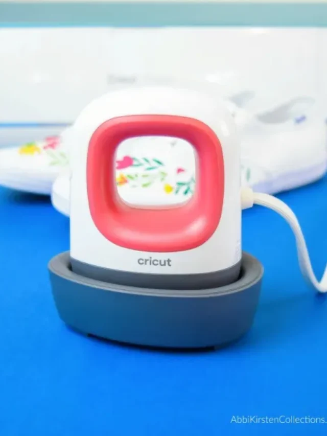 Shallow focus photo on a Cricut EasyPress Mini with a pair of white sneakers on the background