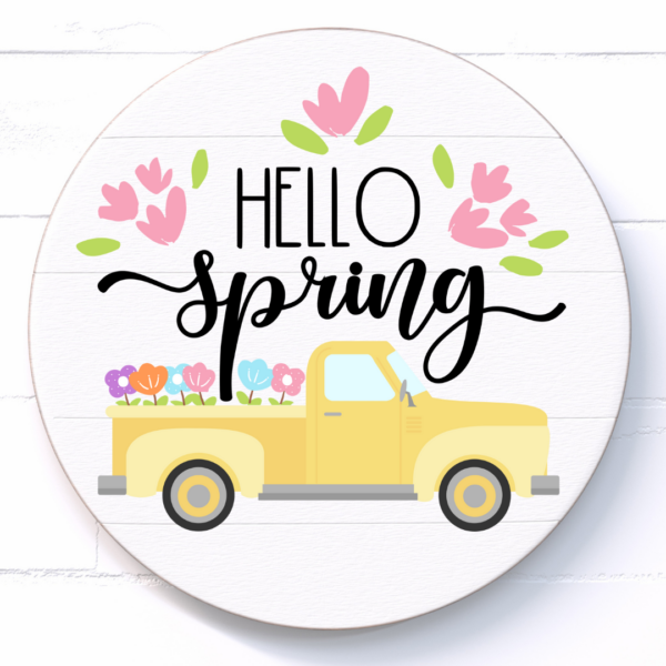 A white wood sign with the words "hello spring" and a yellow truck with flowers. Find this SVG on Abbi Kirsten Collections. 