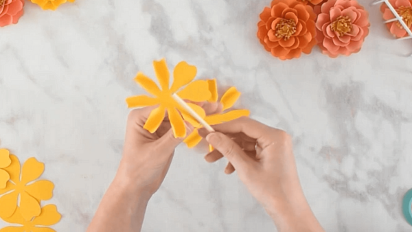 Curling paper flower petals