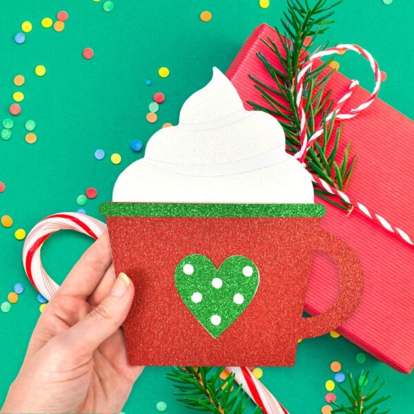 Red and green Christmas coffee gift card holder craft. Use your Cricut to make these coffee cup card holders. Download the free SVG cut files.
