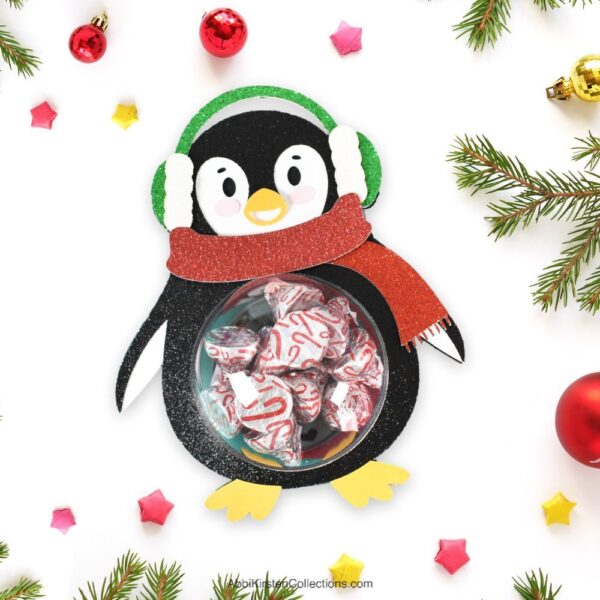 Cute penguin candy holder craft.