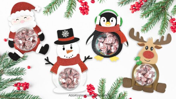 Christmas candy holders. Image shows a Santa Claus, Reindeer, Penguin and Snowman candy holder craft. 