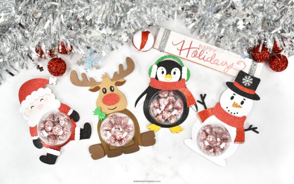 Christmas candy holders. Image shows a Santa Claus, Reindeer, Penguin and Snowman candy holder craft. 