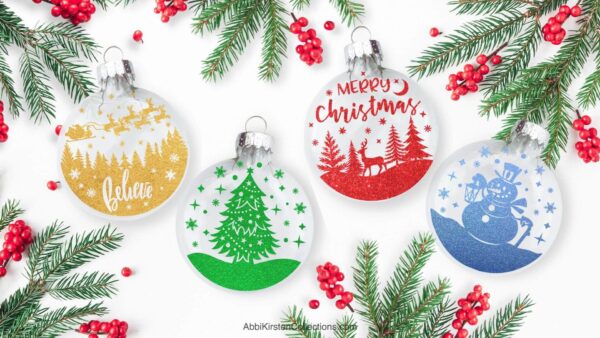 Image shows a set of four floating Christmas ornaments crafted with a Cricut machine. 
