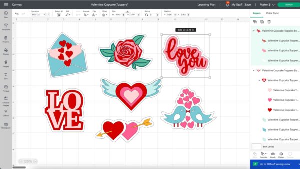 A screenshot of seven Valentine's Day cupcake topper designs in Cricut Design Space includes two hearts with an arrow, a rose, a love letter with hearts, the word “Love,” a heart with wings, two bluebirds kissing with pink hearts,  and “Love you.”  