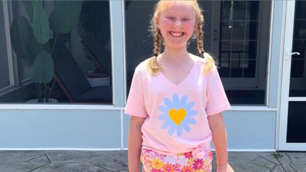 Little girl wearing color changing vinyl tshirt made with Cricut