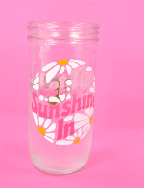 Pink and white vinyl on a glass mason jar. 