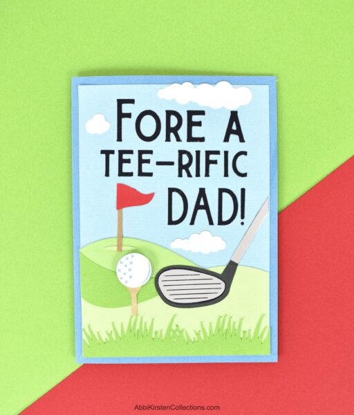 The image shows a card for Father's Day that reads, Fore A Tee-rific Dad made with Cricut. 