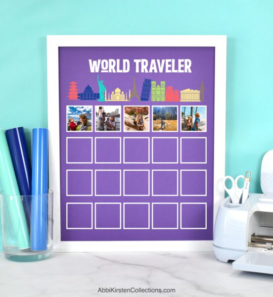 The image shows a world traveler picture display on a purple matboard with a white frame. This project was created using a Cricut machine, vinyl and print then cut sticker vinyl. 
