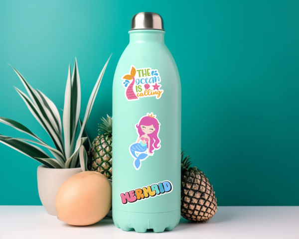 Teal water bottle decorated with DIY mermaid stickers made with Cricut. 