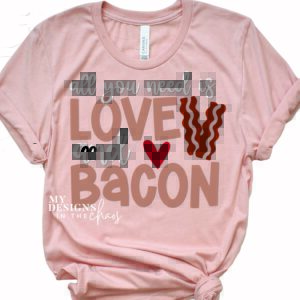 Coral-colored t-shirt with text All you need is love and bacon with heart and bacon slices