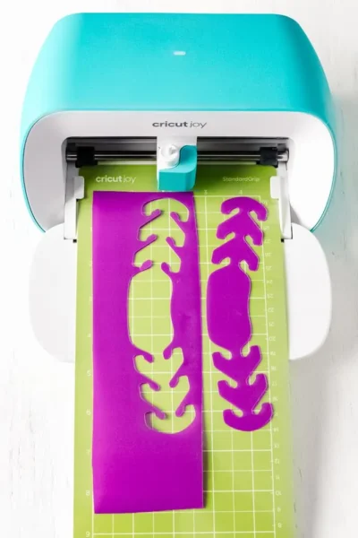 Free Cricut file for cutouts of pink ear savers on a Cricut Joy machine.