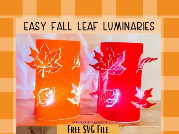 Free SVG craft of two lit luminaries of orange and red with fall leaves.