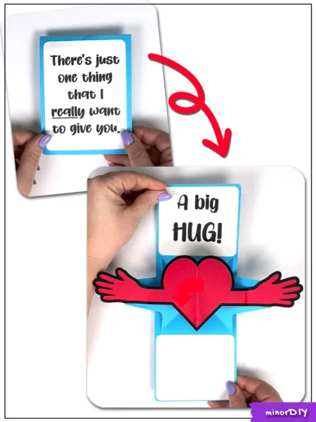 Blue and white Valentine card with red heart and arms and text A Big HUG and insert card. 