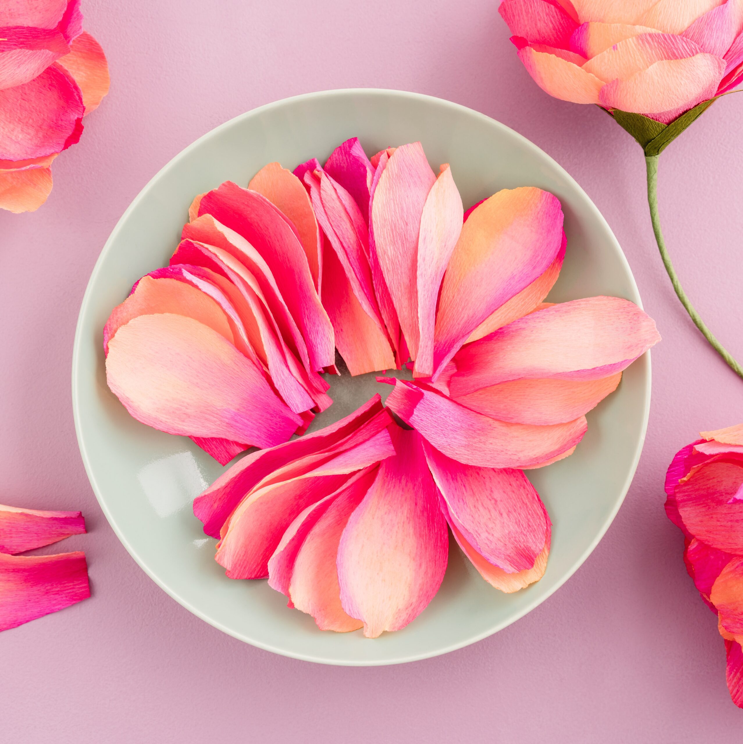 Crepe paper flower petals in a bowl