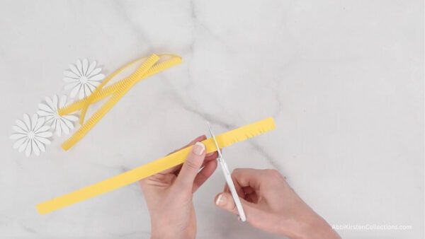 cutting mini daisy centers by hand