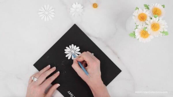 curling petal with tool on shaping mat