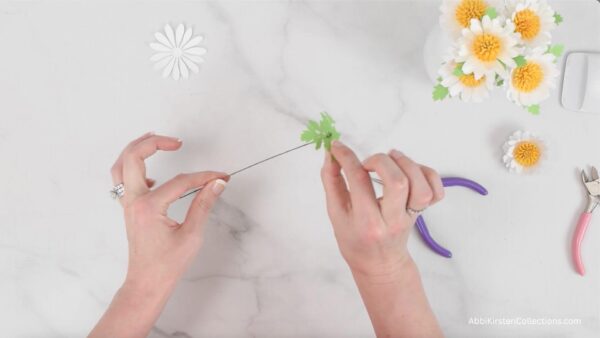 adding the leaf to the wire stem